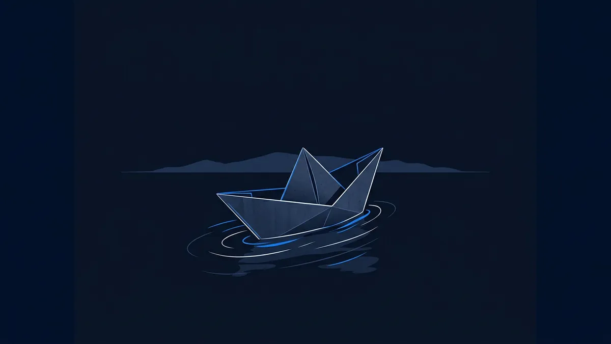 A paper boat folded in origami style floats on dark navy water with ripples around it, silhouetted hills visible at the horizon, rendered in deep blue tones.
