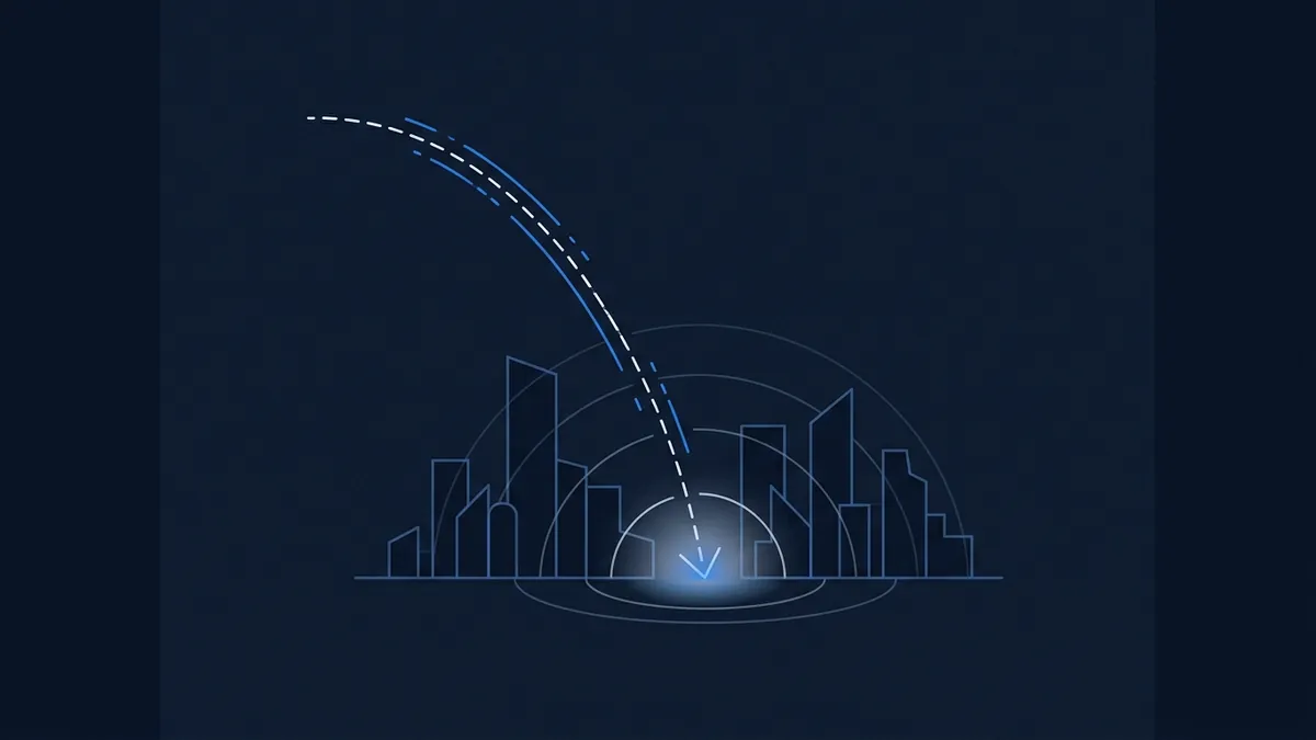 A stylised dark-navy diagram showing two curved trajectory lines, one blue and one white dashed, arcing down toward a glowing dome shield over a geometric city skyline silhouette, with concentric elliptical rings suggesting a protected zone.