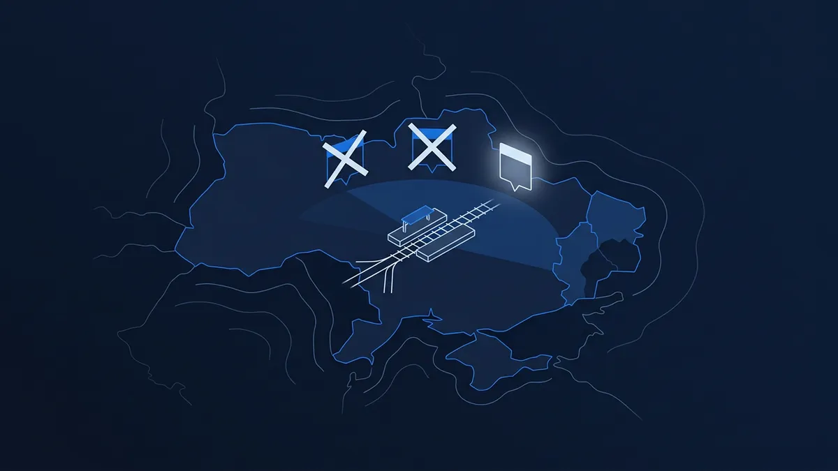 A dark navy stylised map outline of Ukraine with topographic contour lines, featuring a 3D isometric railway track icon at centre, two blue X markers and one glowing chat-bubble icon above it.