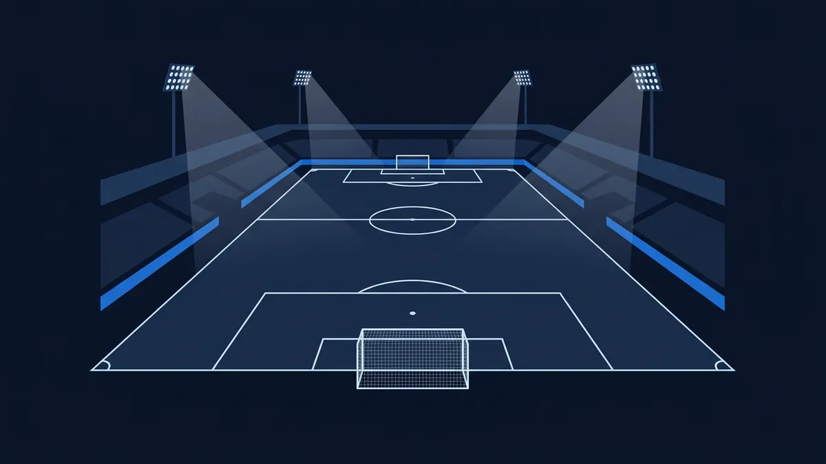 A stylised isometric football stadium at night in deep navy and blue, with four floodlit towers casting beams over a geometric pitch showing goals, penalty areas, centre circle and halfway line.