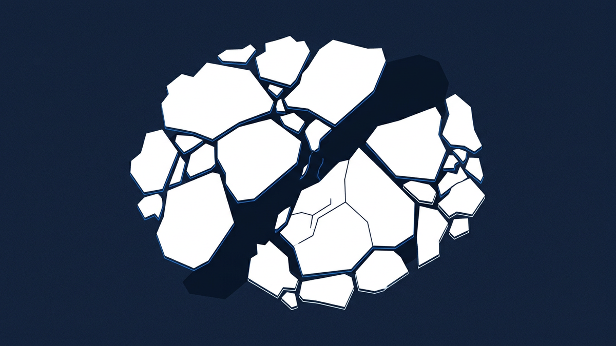A vast expanse of fractured Arctic sea ice viewed from above, dark ocean showing through widening leads between the floes