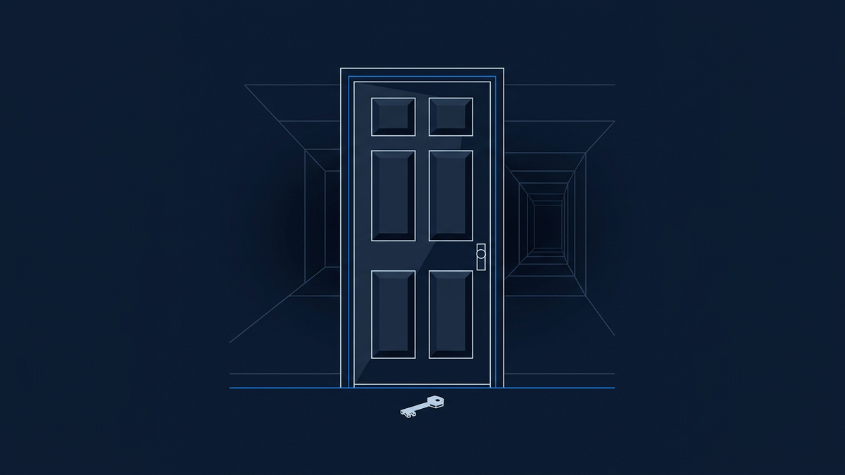 A heavy ornate office door standing closed and centred in an empty corridor, with a single key resting motionless on the floor before it