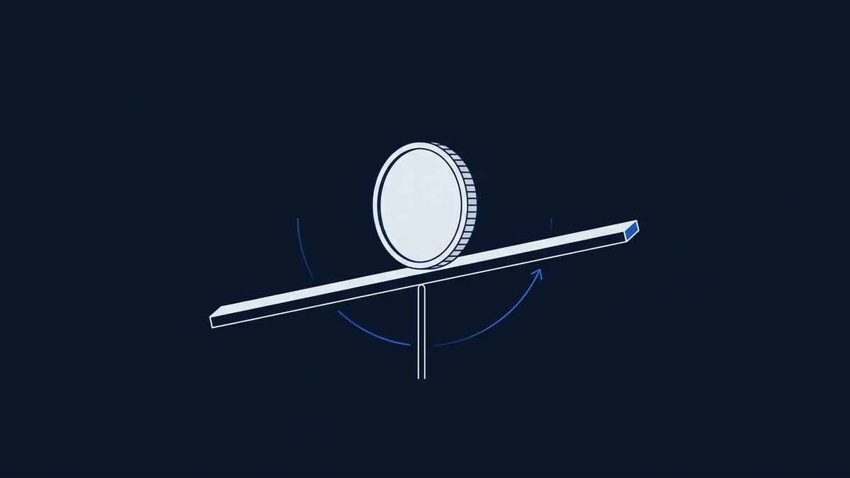 A stylised coin standing upright balances on a tilting beam pivoting on a central fulcrum, with curved blue arrows beneath suggesting rotation or probability, all rendered in white and blue on a dark navy background.